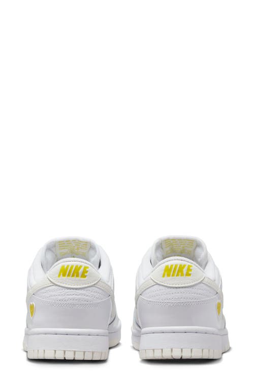 Shop Nike Dunk Low Basketball Shoe In White/sail/opti Yellow