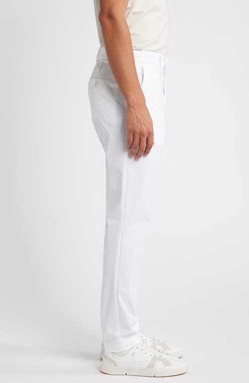 Shop J. Lindeberg Vent Flat Front Performance Golf Pants In White