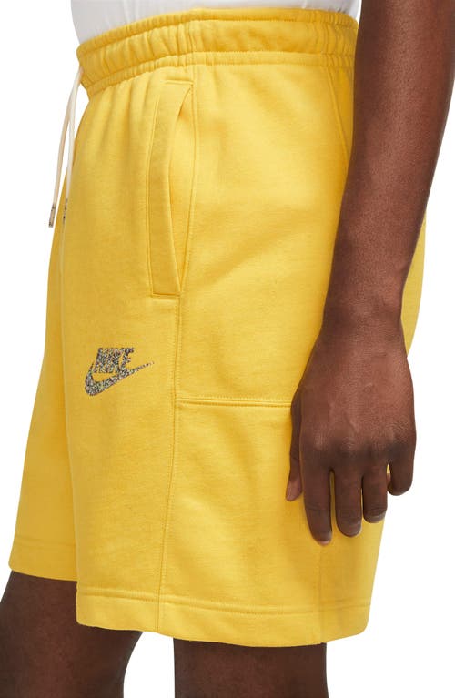 Shop Nike Revival Fleece Shorts In Vivid Sulfur/white