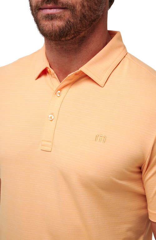 Travismathew The Heater Solid Short Sleeve Performance Polo In Apricot
