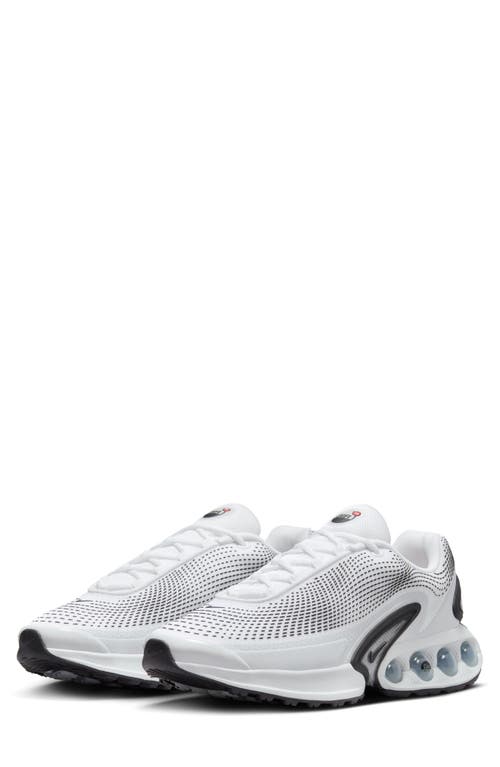 Shop Nike Air Max Dn Sneaker In White/black/photon Dust