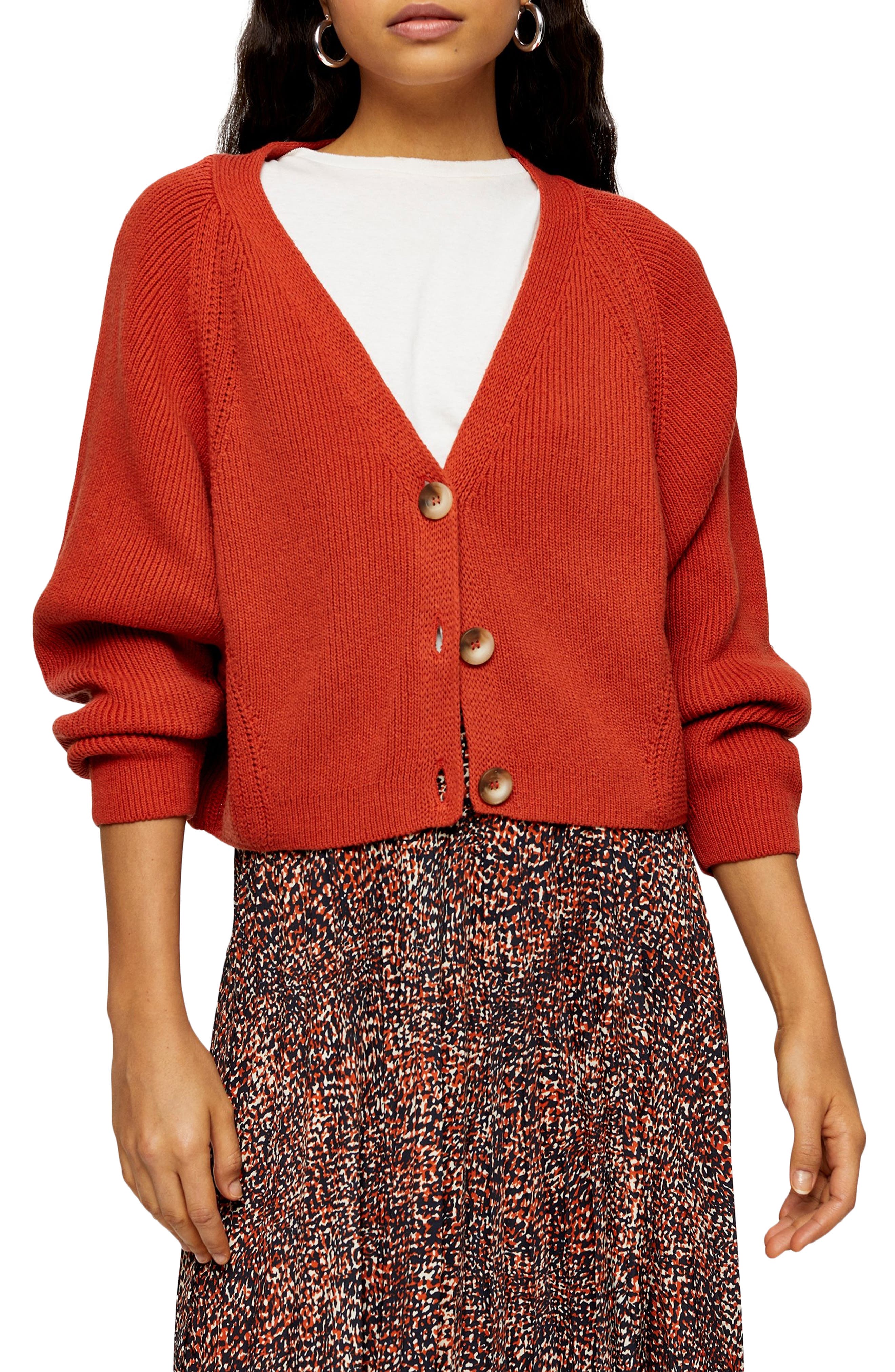 orange cropped cardigan