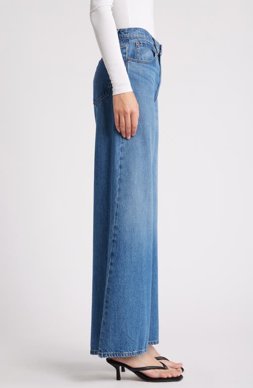 Shop Frame Easy Wide Flare Jeans In Lucite