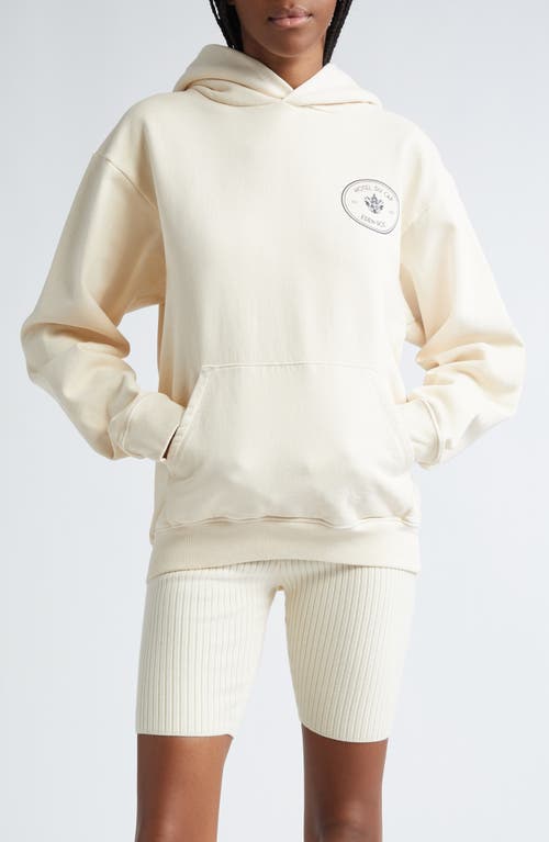 Sporty And Rich Sporty & Rich Eden Roc Crest Cotton Graphic Hoodie In Cream