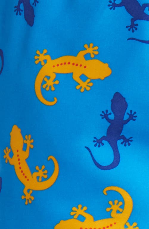 Shop Tom & Teddy Gecko Print Performance Swim Trunks In Blue/orange