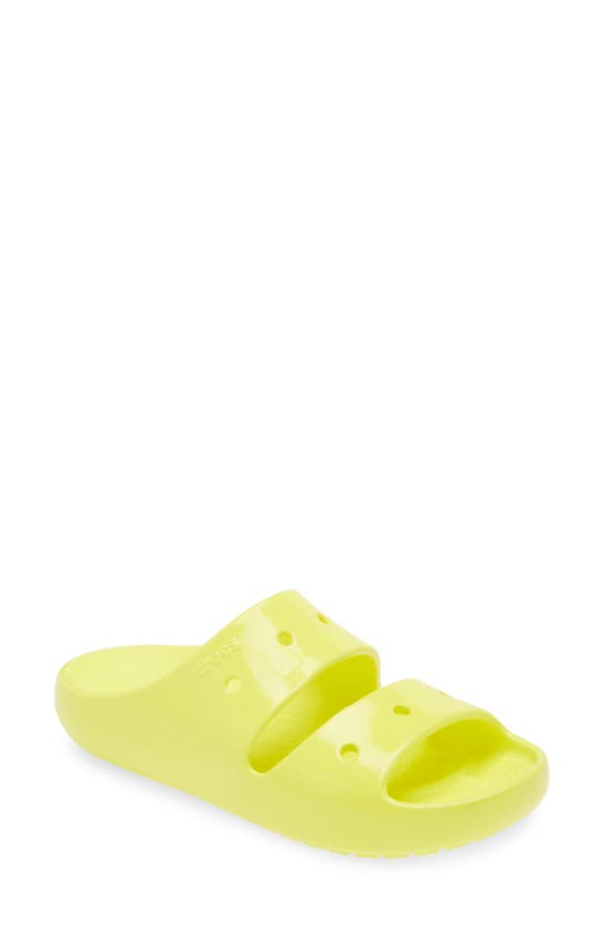 Shop Crocs Classic Neon Slide Sandal In Acidity