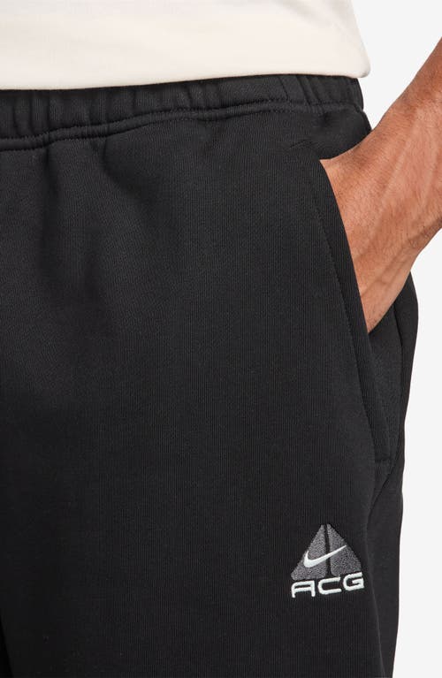 Shop Nike Acg Lungs Therma-fit Repel Tuff Fleece Pants In Black/anthracite/white