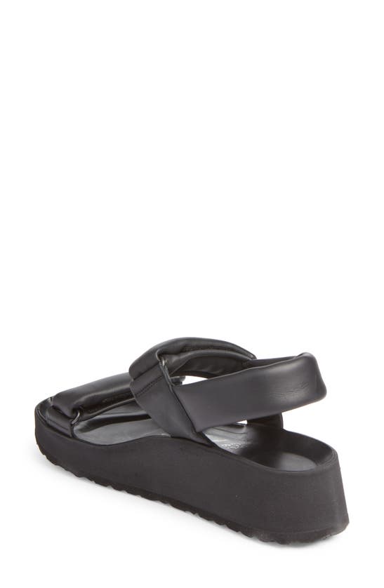 Shop Birkenstock Theda Wedge Sandal In Black