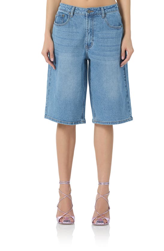 Shop Afrm Low Rise Denim Bermuda Shorts In South Pacific Wash