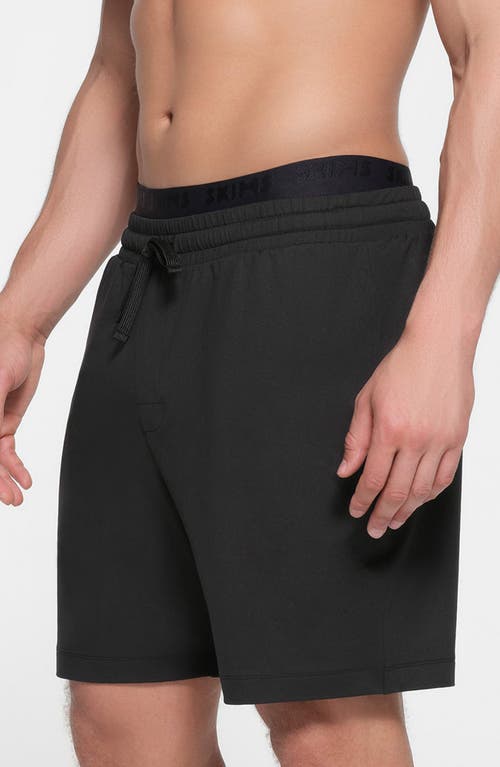 Shop Skims Outdoor Jersey Sweat Shorts In Onyx