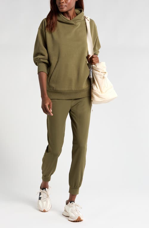 Shop Zella Move In Pocket Joggers In Olive Night