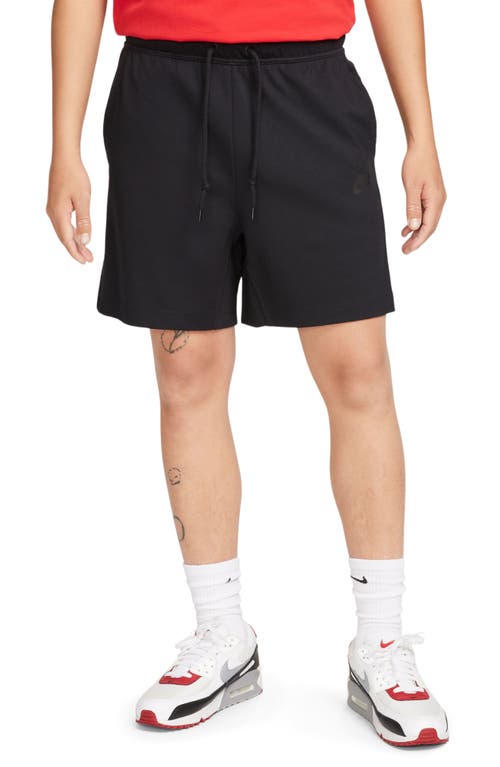 Shop Nike Lightweight Tech Knit Shorts In Black/black