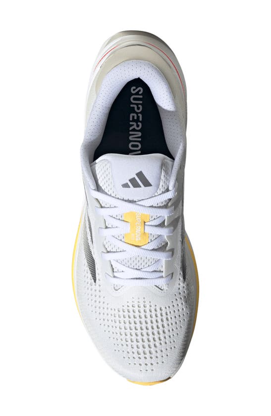 Shop Adidas Originals Supernova Rise Running Shoe In White/ Iron Metallic/ Spark
