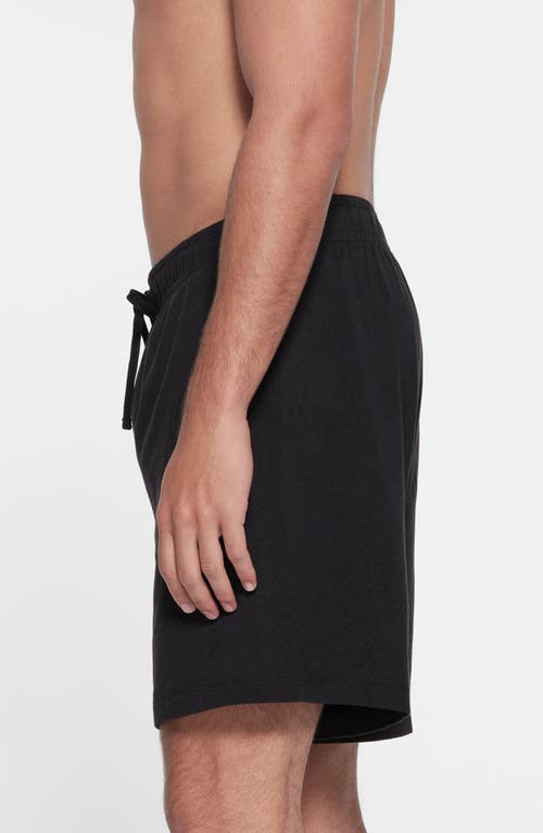 Shop Skims Stretch Cotton Blend Jersey Lounge Shorts In Obsidian