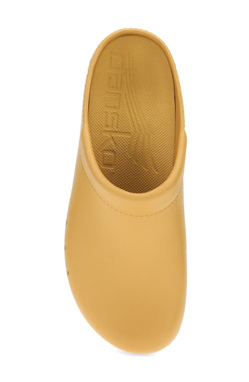 Shop Dansko Kane Clog In Mustard