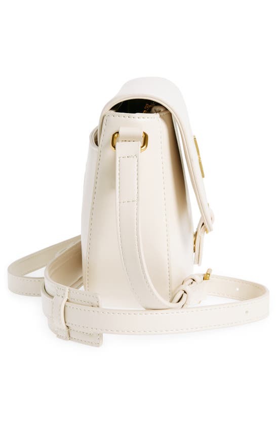 Shop Love Moschino Quilted Crossbody Bag In Ivory