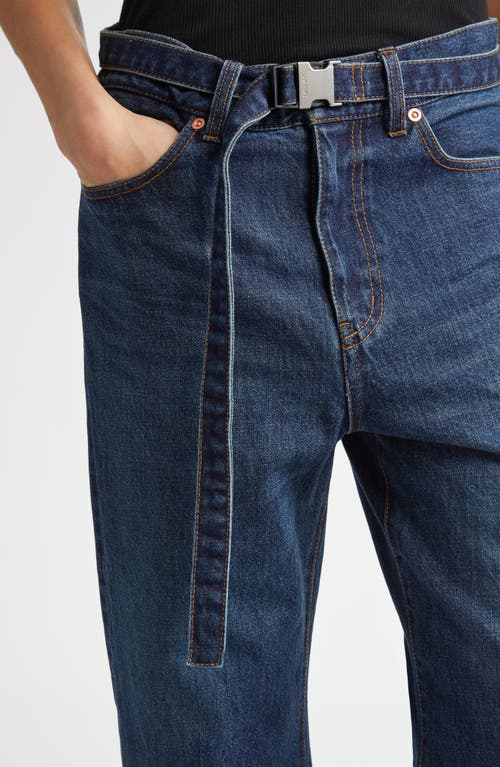 Shop Sacai Belted Crop Bootcut Jeans In Blue