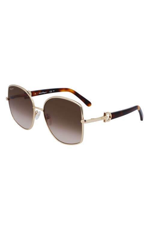 Shop Ferragamo Gancini 57mm Gradient Oval Sunglasses In Gold/brown Gradient