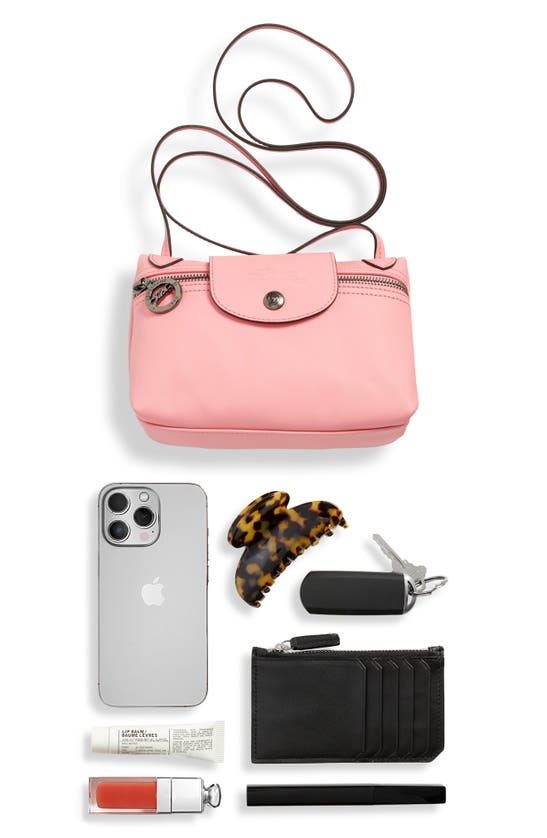 Shop Longchamp Extra Small Le Pliage Leather Crossbody Bag In Pink