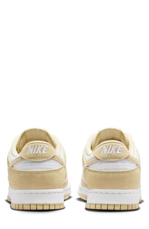 Shop Nike Dunk Low Se Basketball Sneaker In White/tm Gold/white