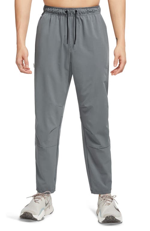 Nike Dri-fit Unlimited Drawstring Pants In Smoke Grey/black/smoke Grey
