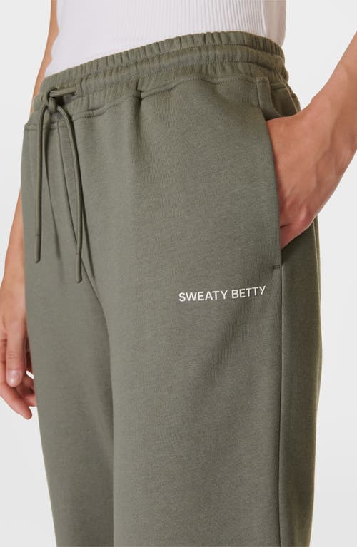 Shop Sweaty Betty Revive Relaxed Joggers In Umbra Green