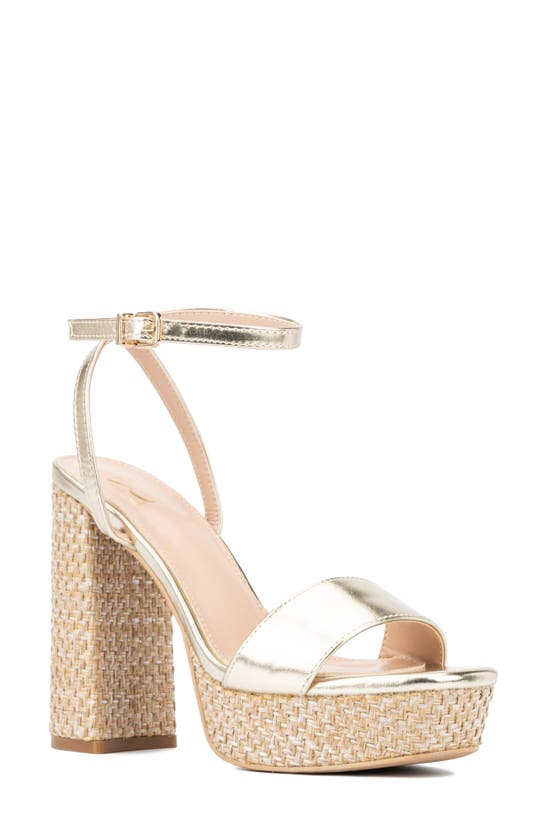 chunky gold platform heels
