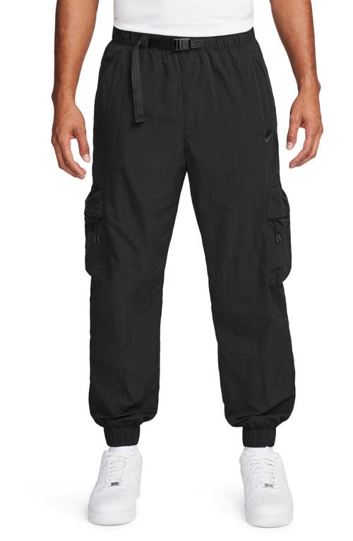 Shop Nike Tech Water Repellent Woven Cargo Pants In Black/black