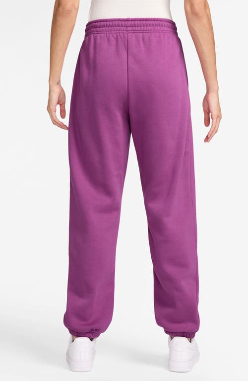 Shop Nike Phoenix Oversize Fleece Sweatpants In Purple/sail