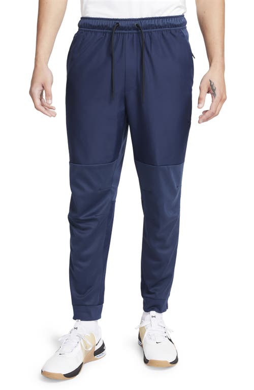 Nike Unlimited Water Repellent Joggers In Blue