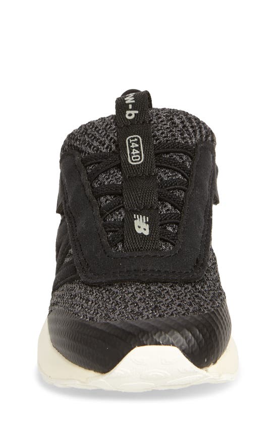 Shop New Balance Kids' 1440 Sneaker In Black/ Angora