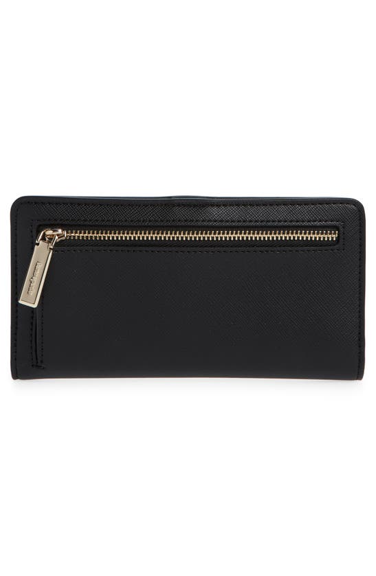Shop Kate Spade Schuyler Large Slim Bifold Wallet In Black