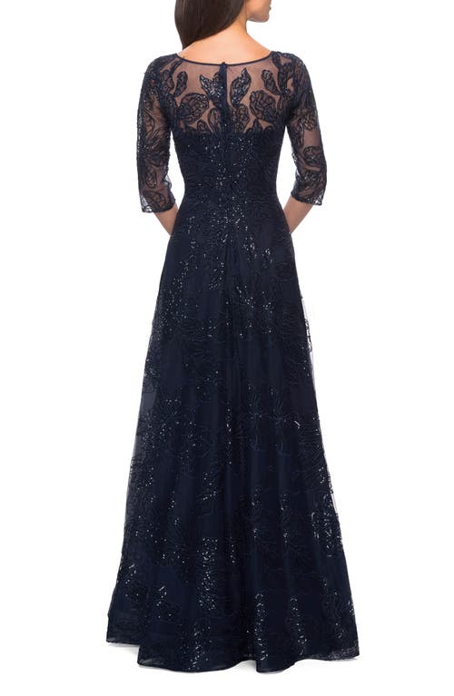 Shop La Femme A-line Lace Sequin Gown With Sheer Scoop Neckline In Navy