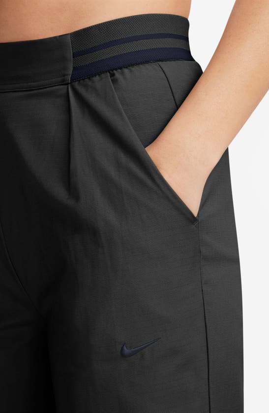 Shop Nike High Waist Cotton Pants In Black/ Obsidian