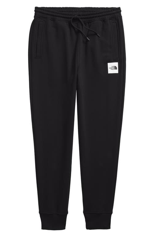 Shop The North Face Core Joggers In Tnf Black/tnf White