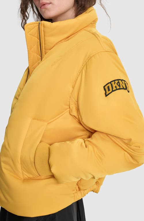 Shop Dkny Coated Satin Puffer Bomber Jacket In Goldenrod