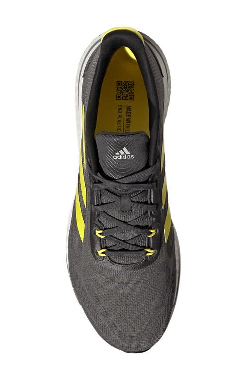 Shop Adidas Originals Adidas Supernova Running Shoe In Grey Six/yellow/dash Grey