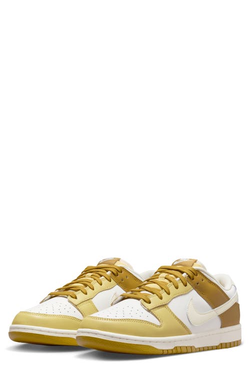 Shop Nike Dunk Low Retro Basketball Sneaker In Bronzine/coconut Milk/gold