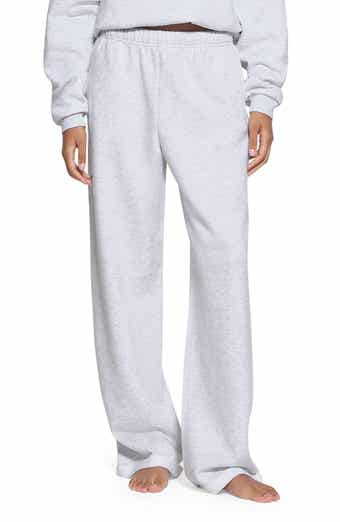 SKIMS wearing a size small in light heather grey folded pants and shi, Skims Fold Over Pant