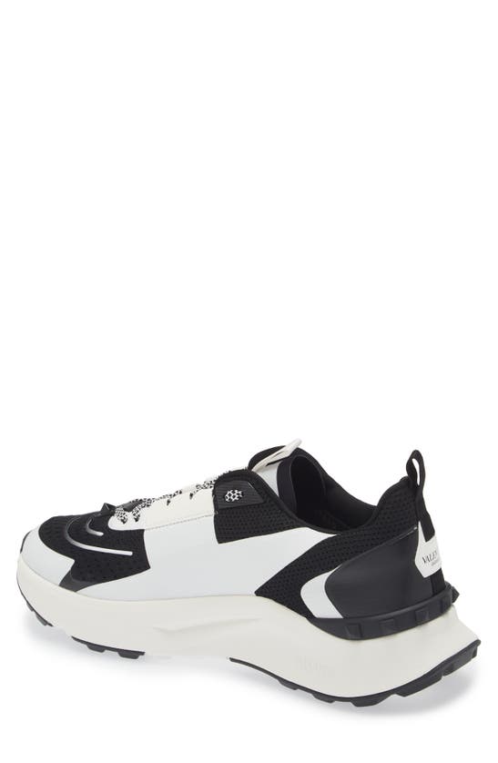 Shop Valentino Garavani Rockstud Knit Sneaker In Nero-bianco