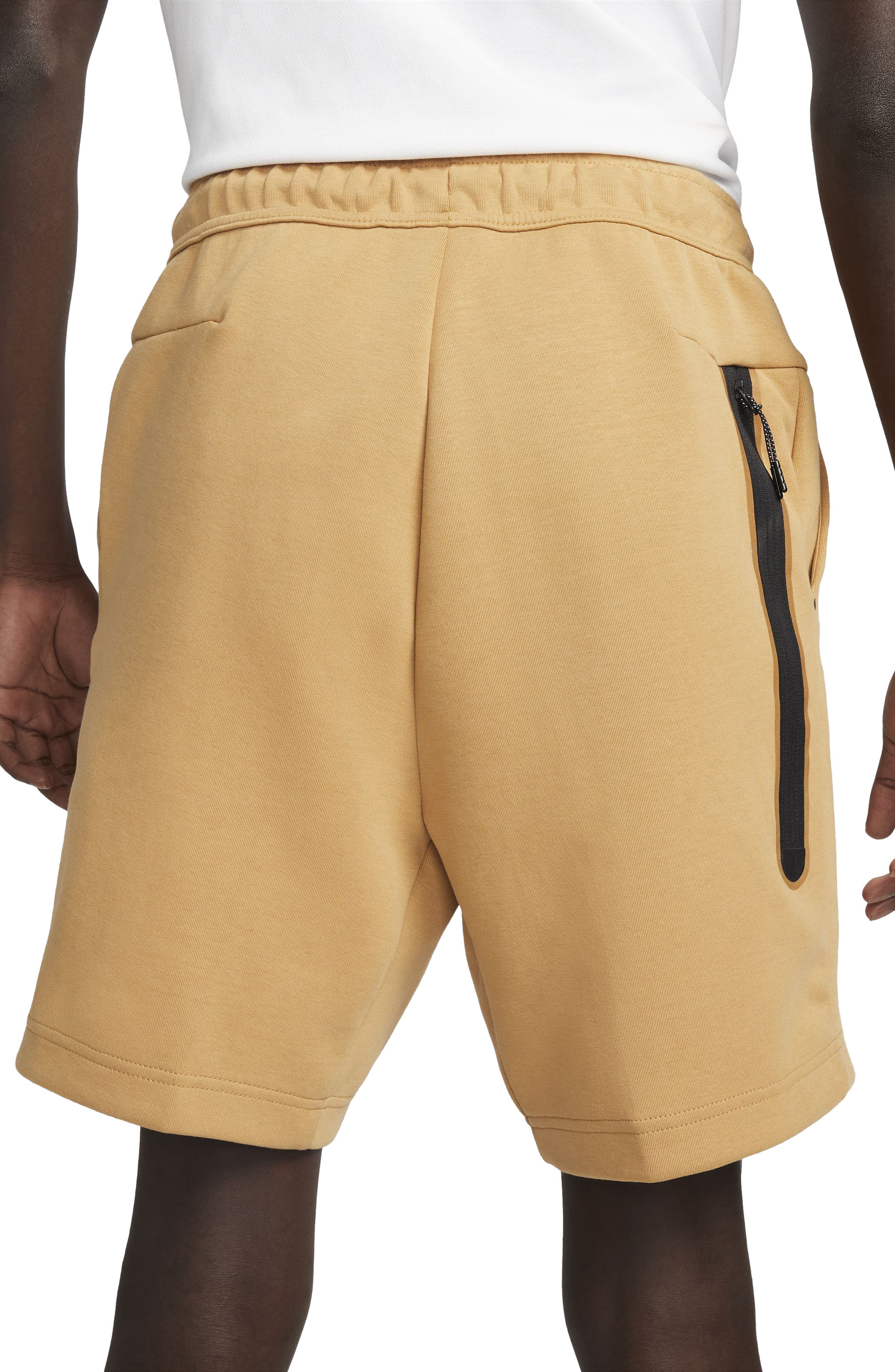 gold nike fleece shorts