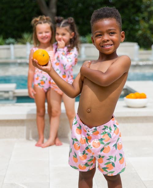 Shop Ruggedbutts Boys Upf50+ Swim Trunks In Orange You The Sweetest