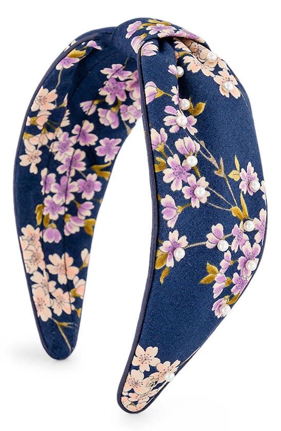 Click to view more detailed imagery on our partner's website Alexandre De Paris Floral Embellished Knotted Headband In Navy Blue