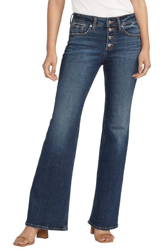 Silver Jeans Co. Suki Curvy Exposed Button Mid Rise Flare Jeans In Blue