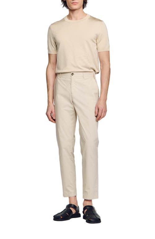 Shop Sandro Cotton Carrot-cut Trousers In Light Grey