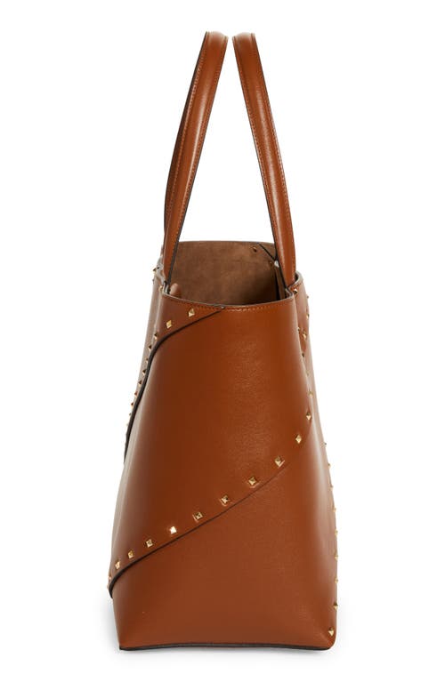 Shop Valentino Garavani Large Rockstud Wispy Leather Tote In Tobacco