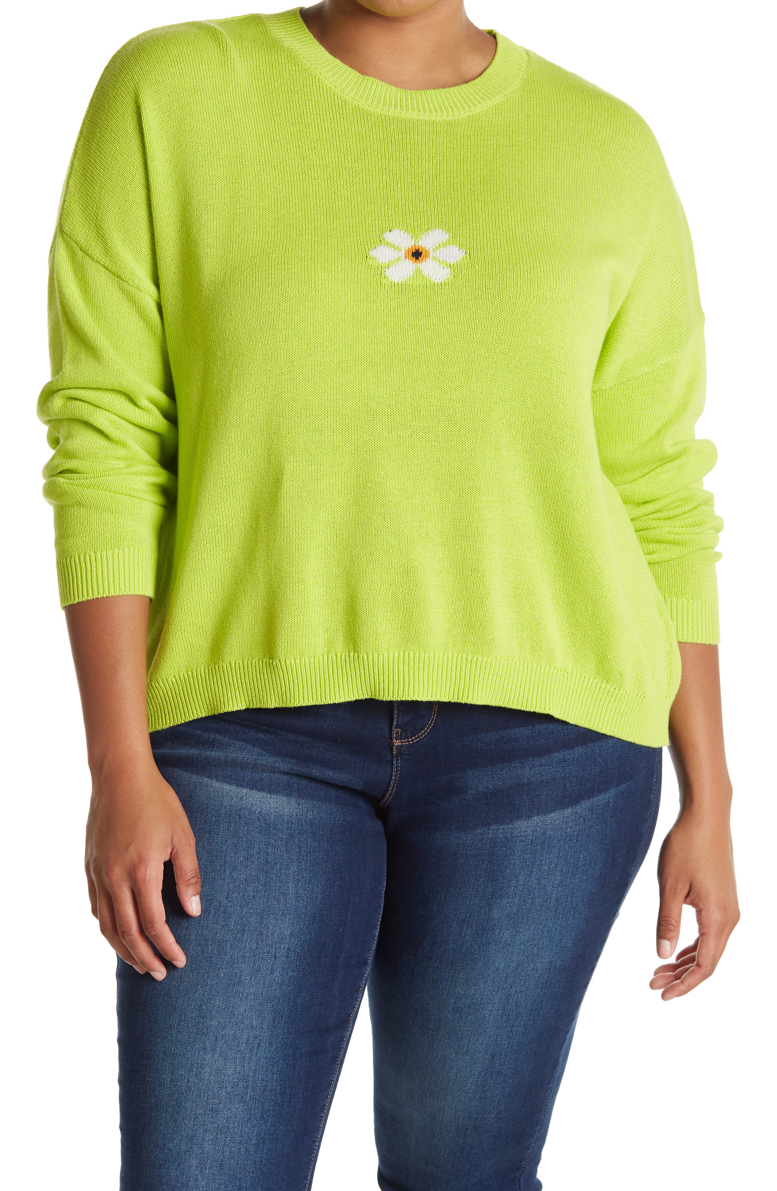 green sweater with daisies