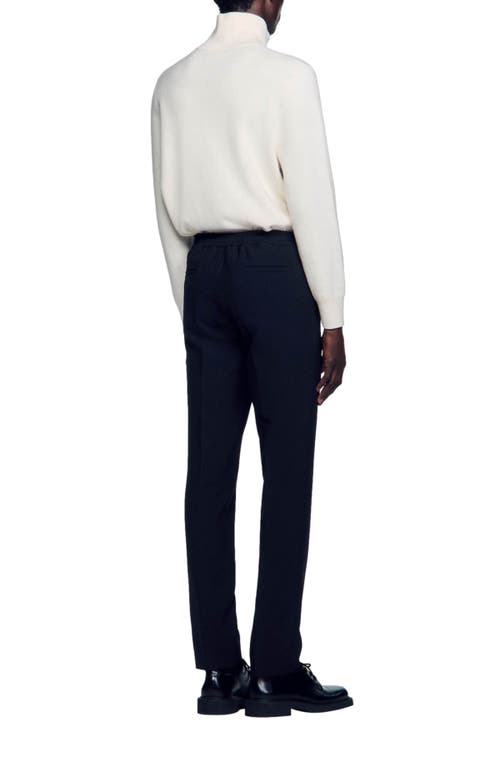 Shop Sandro Jersey Trousers In Black