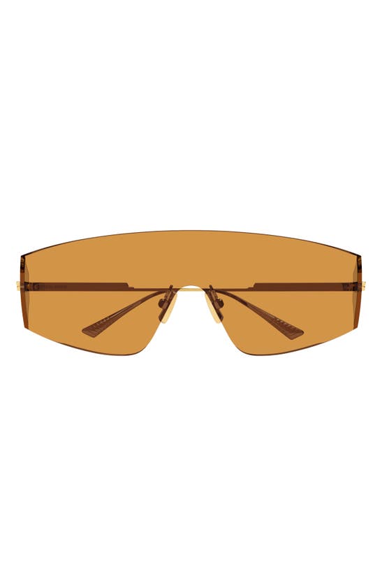Shop Bottega Veneta 99mm Mask Sunglasses In Gold
