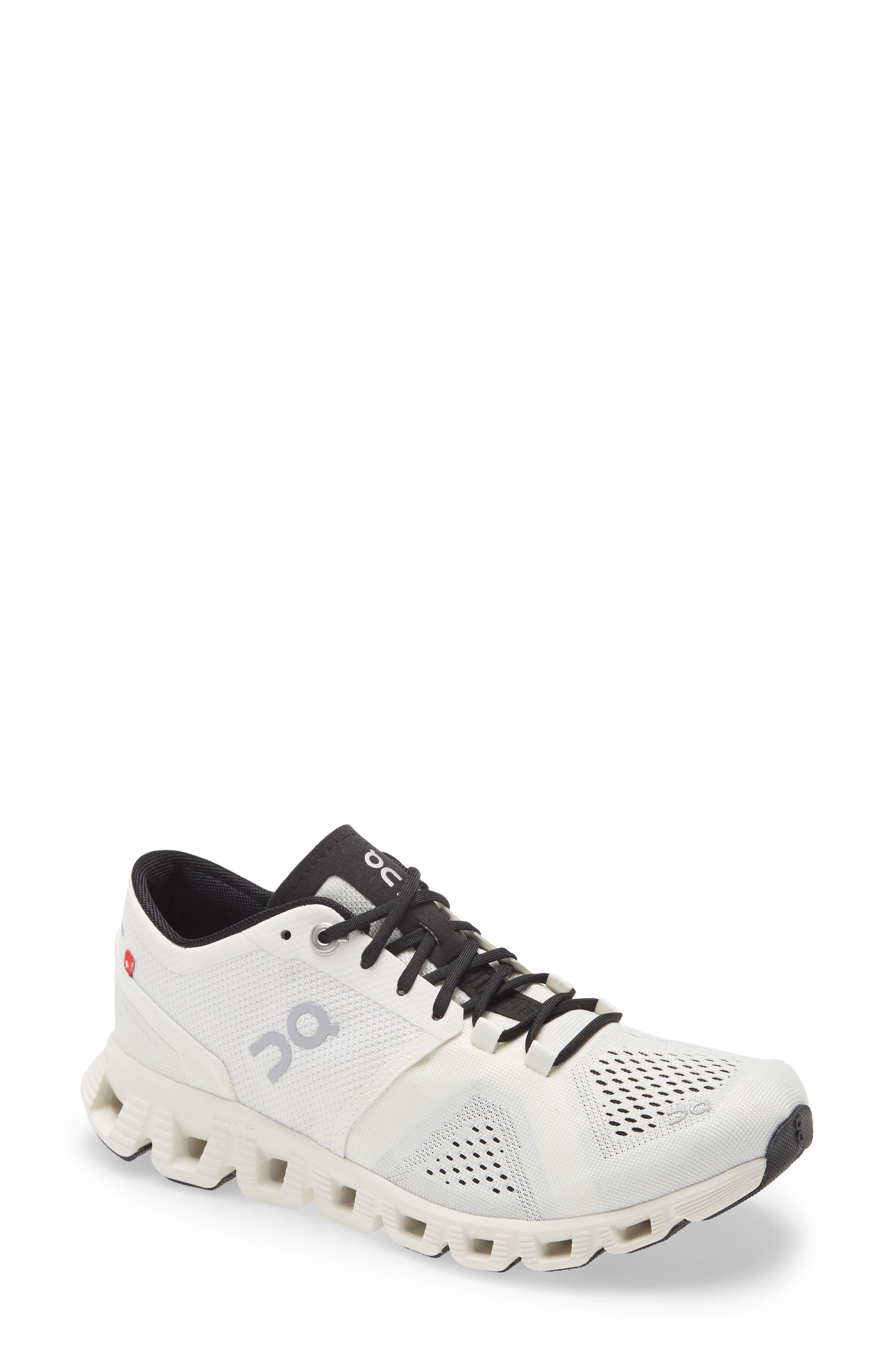 white cross training shoes